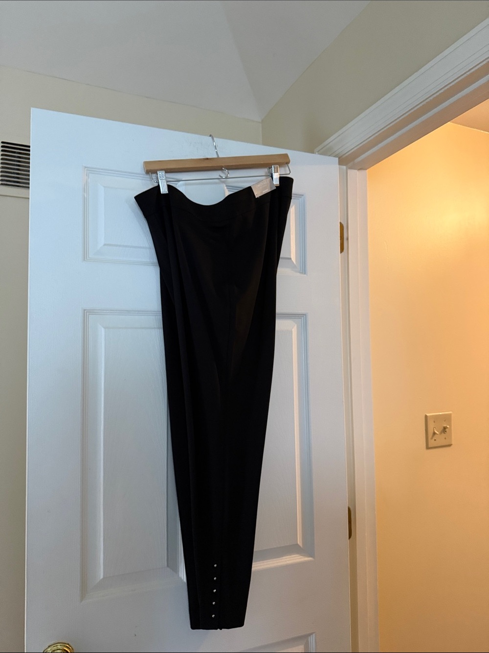 Chico's Black Tapered Leggings with Ankle Button Detail